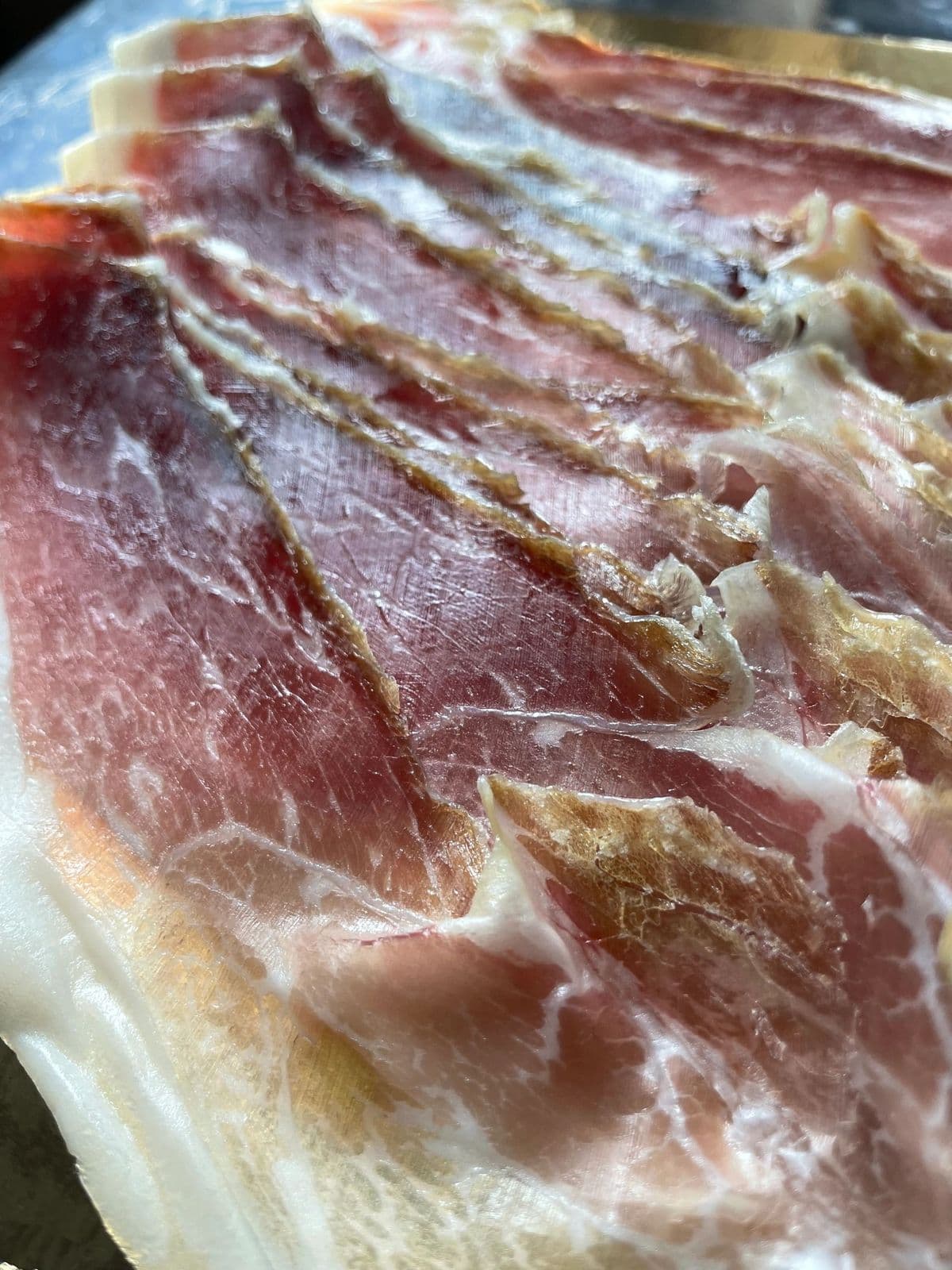 Paper-thin slices of culatello