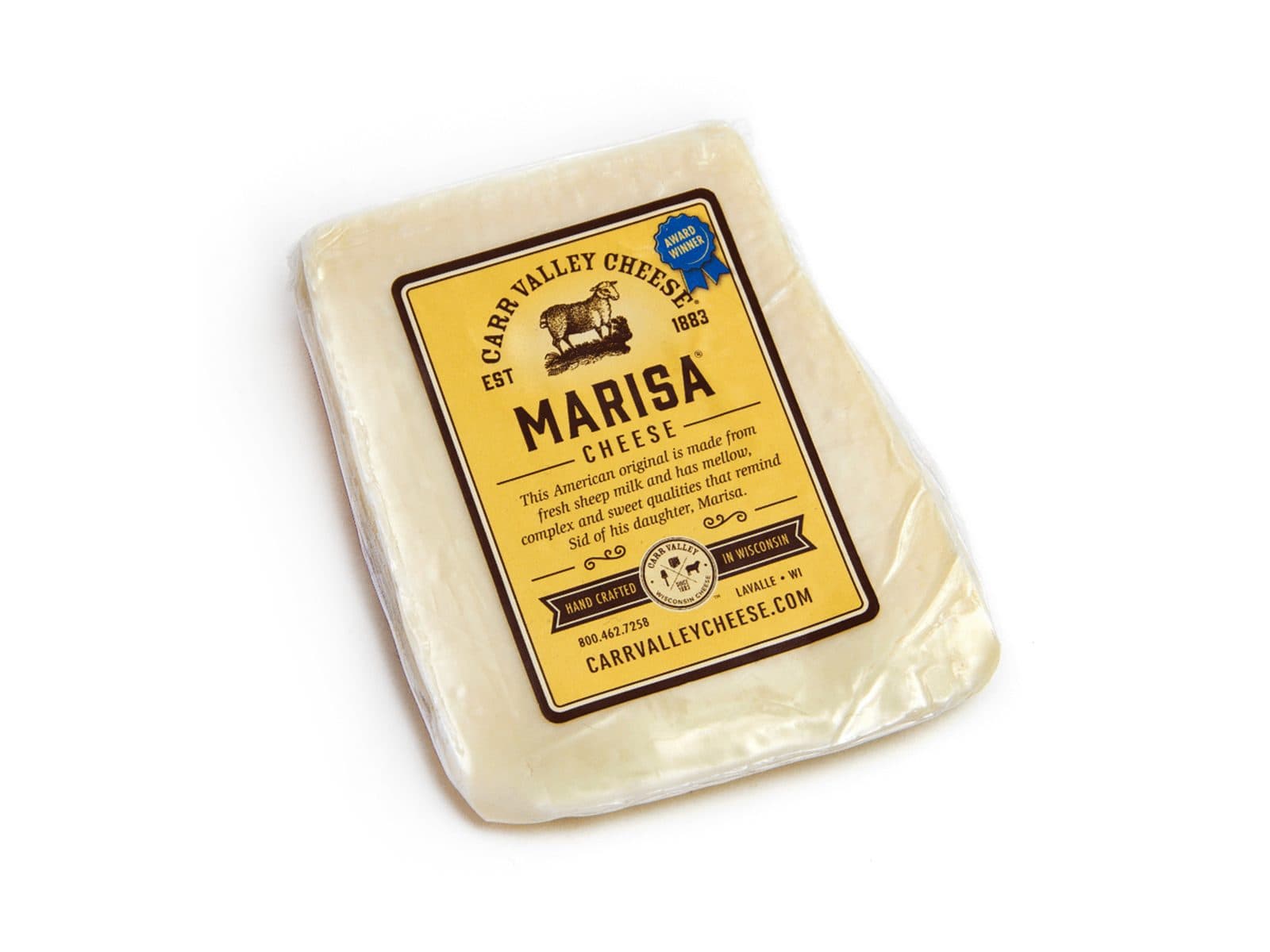 A wedge of Carr Valley Marisa sheep's milk cheese